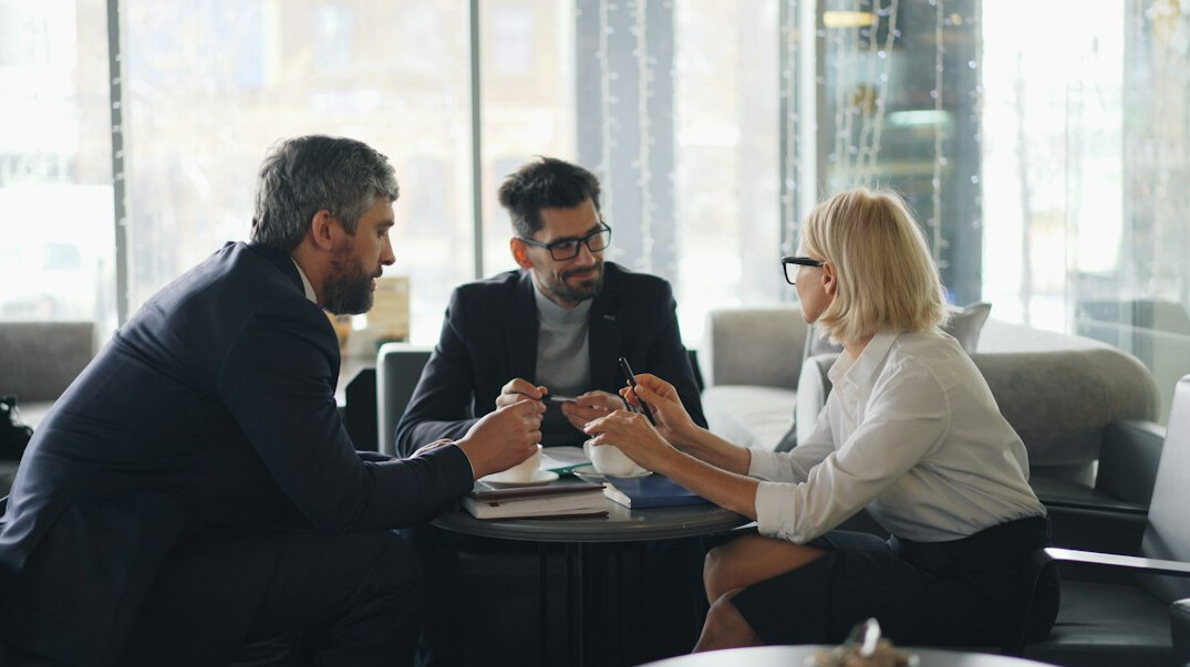group of people in discussion